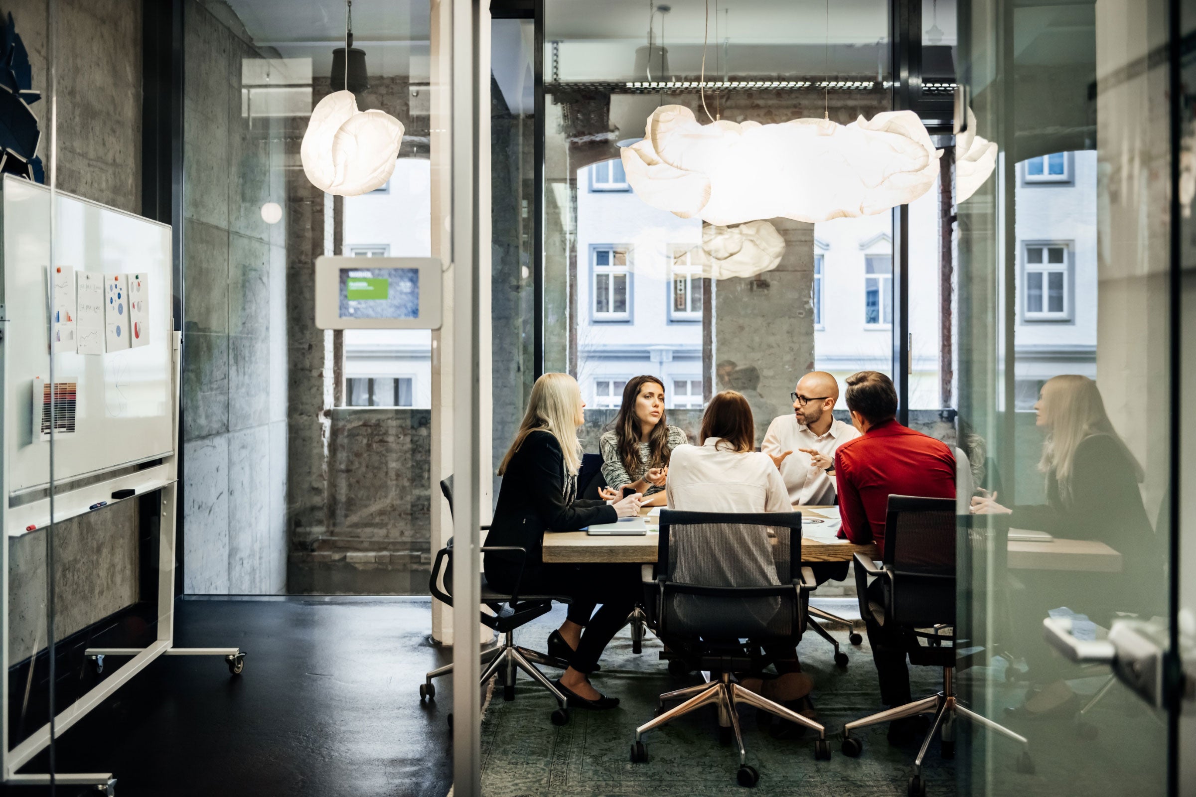 People having a meeting in a conference room