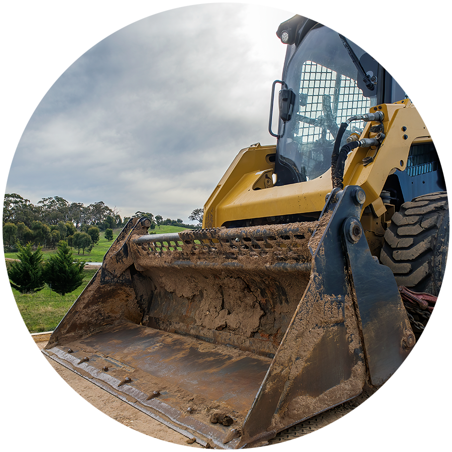 A bulldozer being loaded onto a trailer