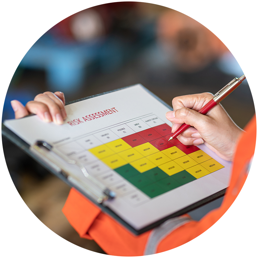 Safety inspector completing a risk assessment matrix table at "High risk" level