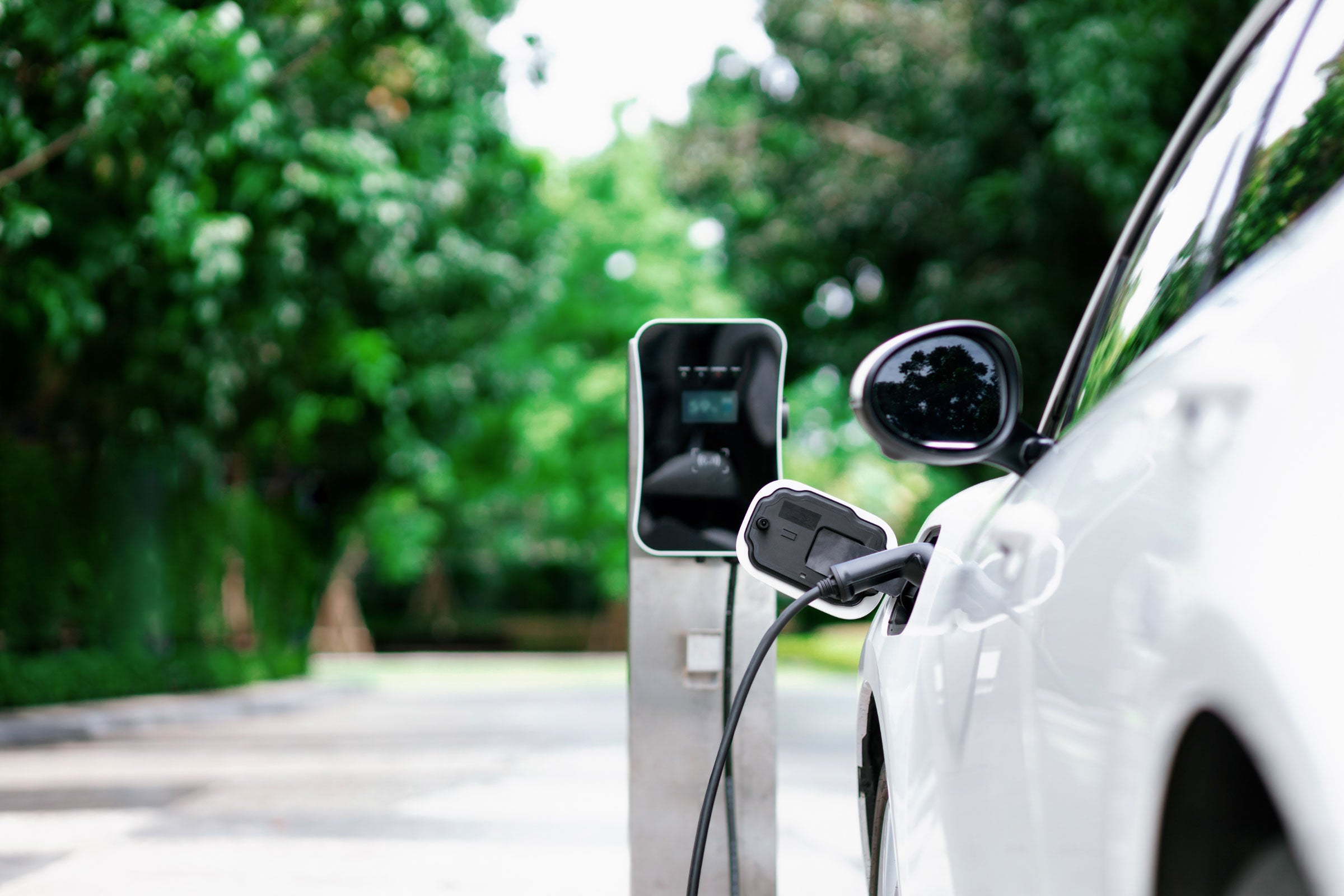 A car charging at an EV charging station