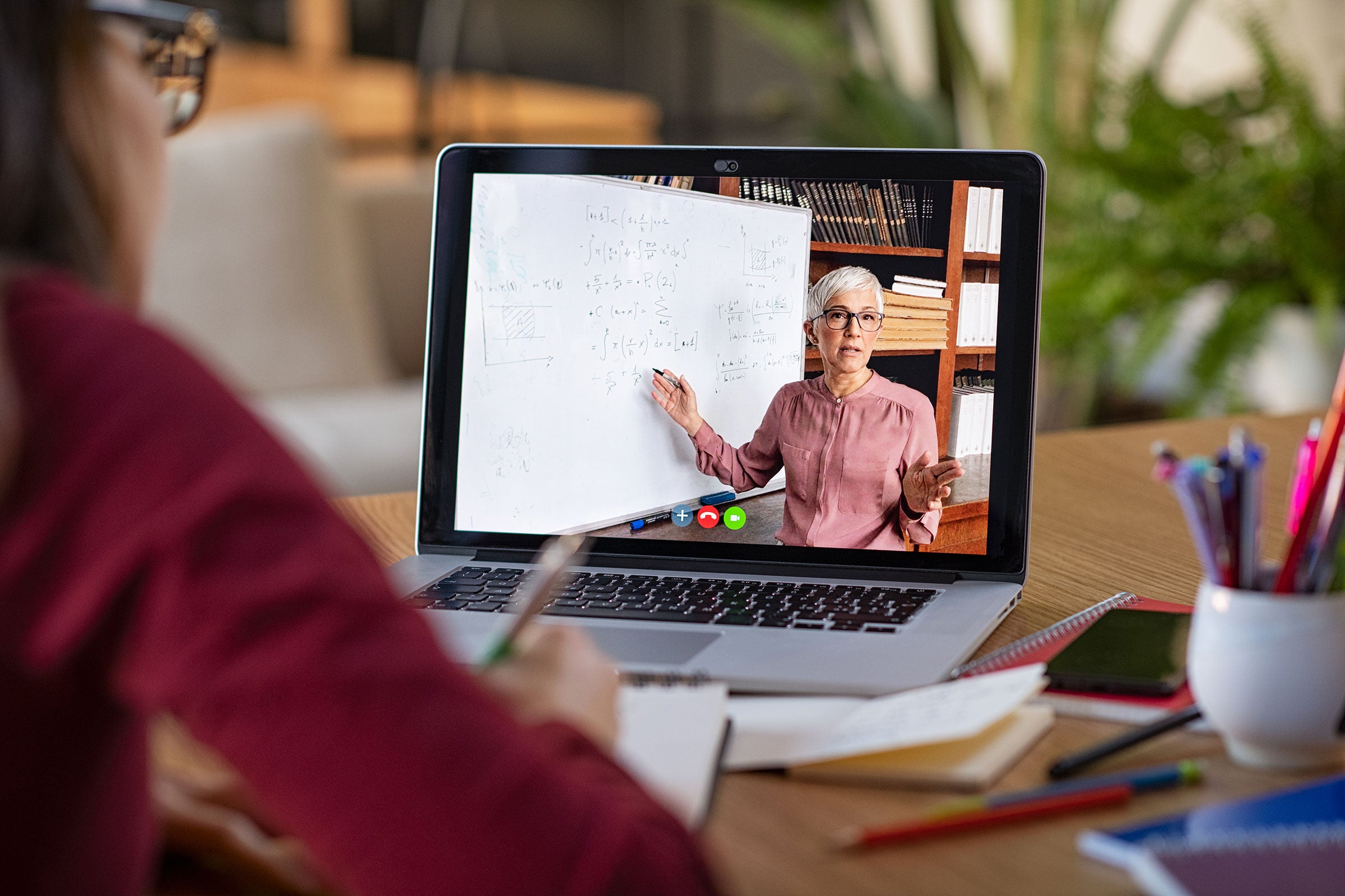 Person taking an online course from home