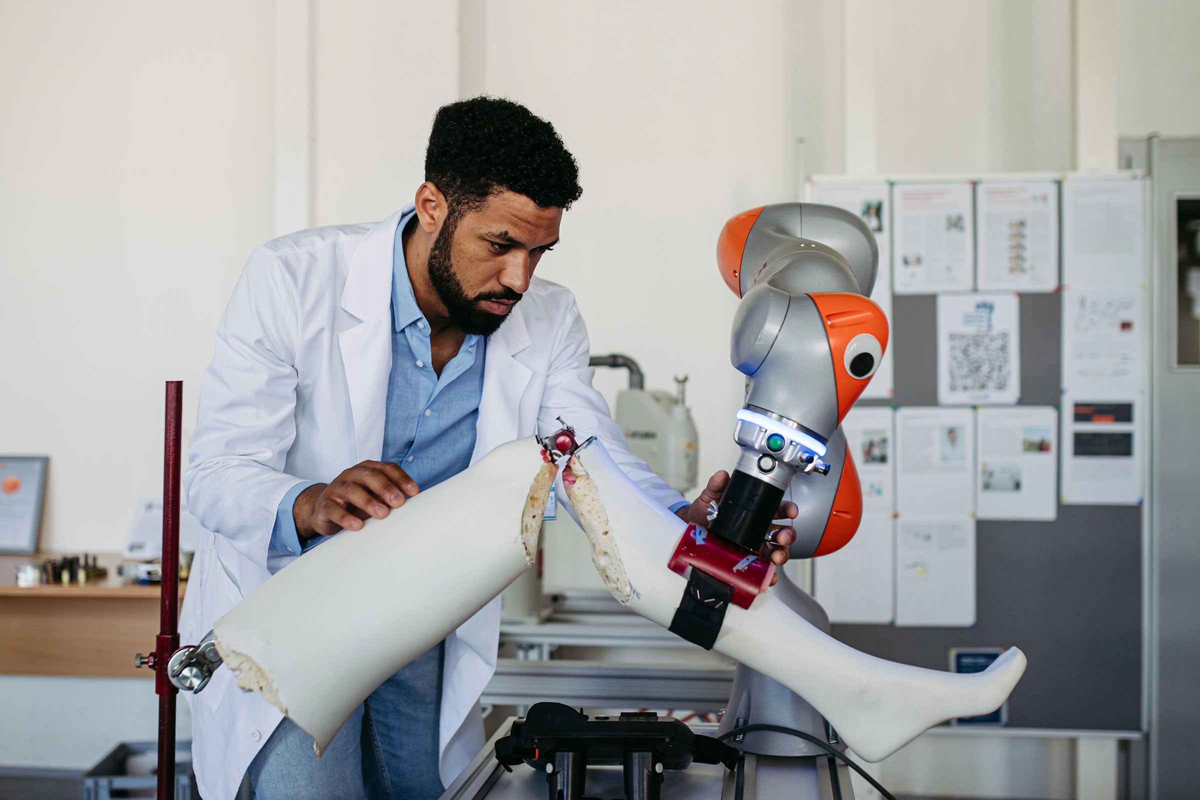 Robotic engineer working on robotic knee replacement surgery project