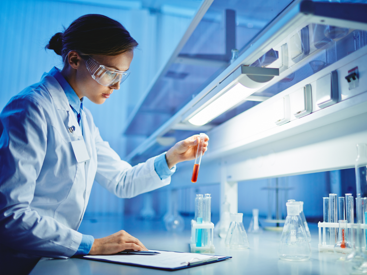 Scientist holding a volumetric flask