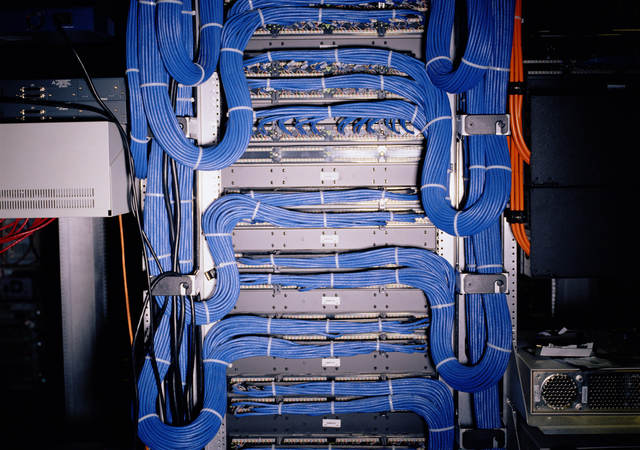 A close-up image of blue telecommunications cable.  