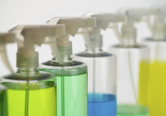 Spray bottles of cleaners and sanitation products