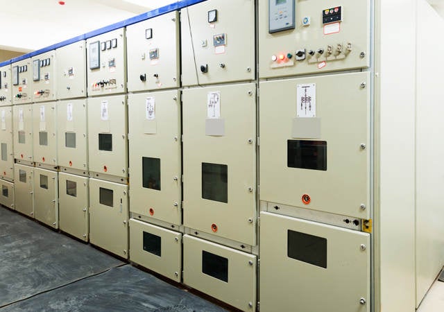 A picture of power distribution equipment inside a power plant. 