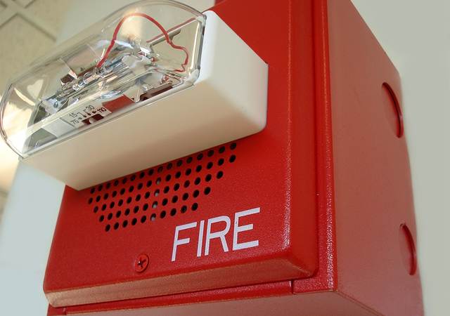 Close-up of fire alarm with speaker and strobe