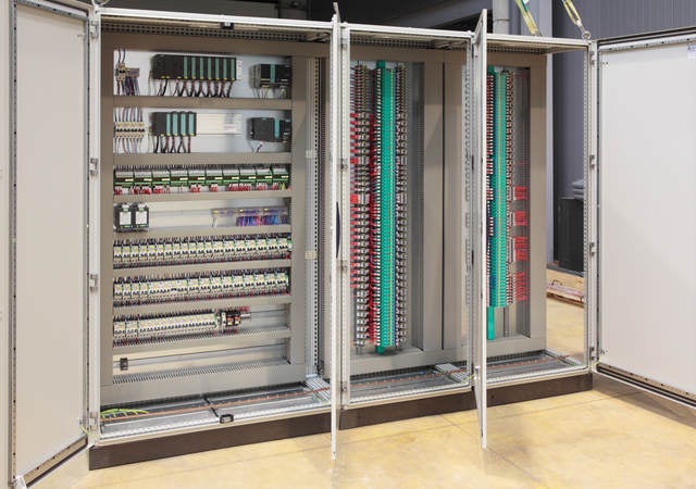 The inside of an industrial control panel board.