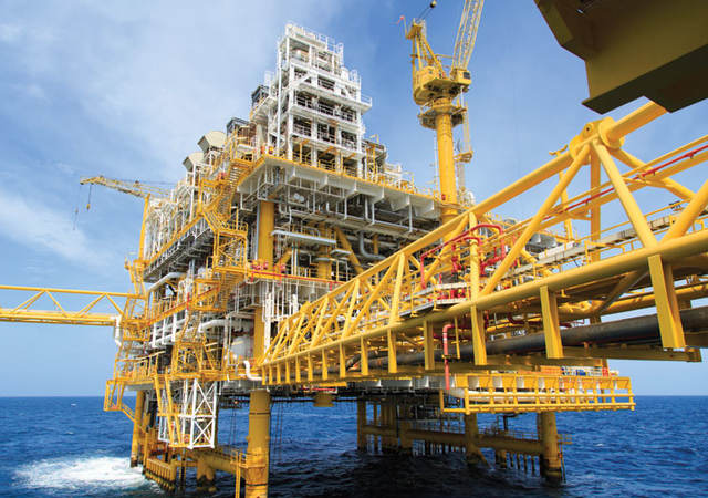 Yellow oil platform on the water