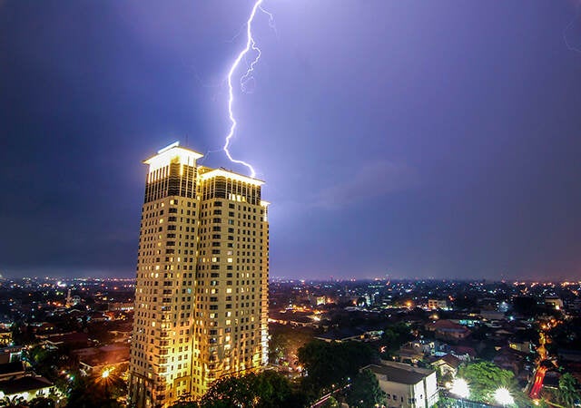 lightning striking building