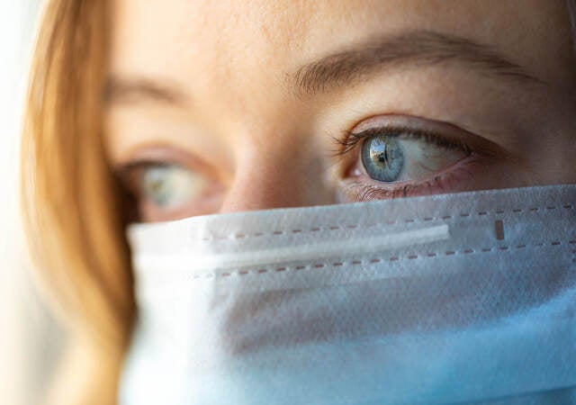 woman wearing non-medical face mask