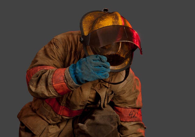 Firefighter wearing unclean gear