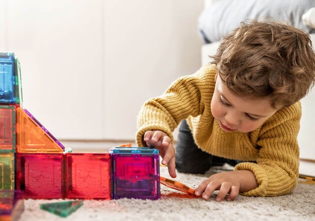 A child playing with a toy