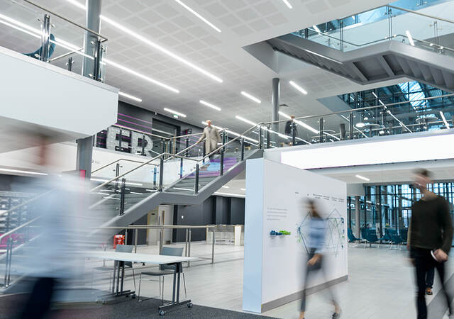 People enjoying the smart features of a building. 