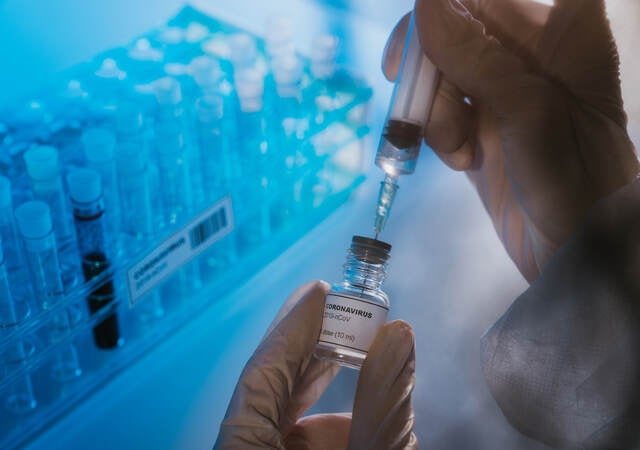 Scientist working with a vaccine 