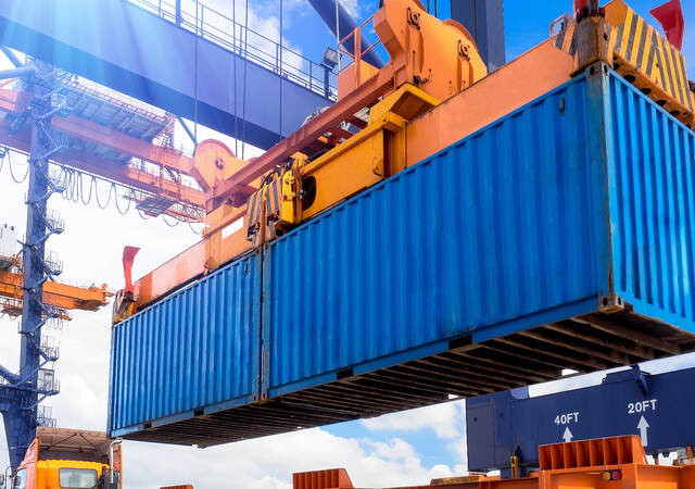 View Of Commercial Dock with containers Against Sky 