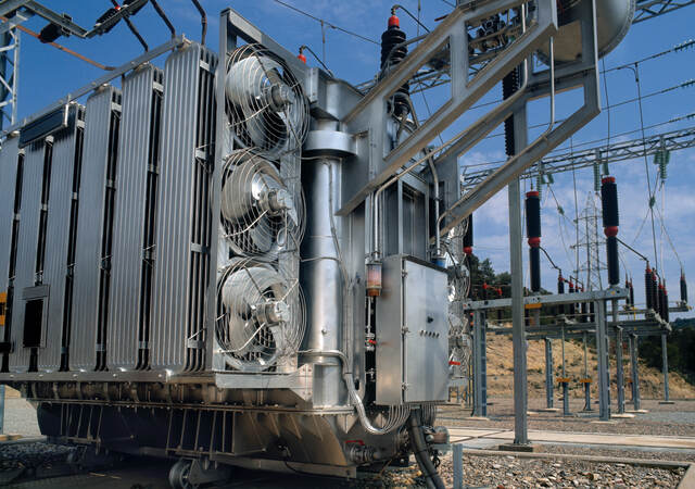 Close up of electrical insulation systems with blue sky background