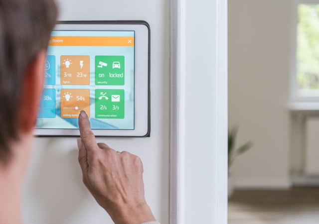 Woman using smart home control screen