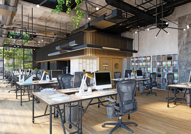 Row of empty desks in a modern office