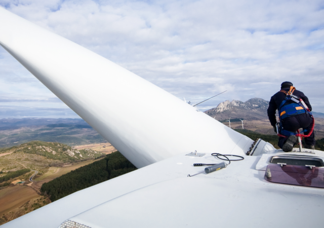 Employee fixing an airplane's wings