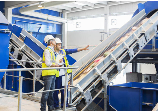 workers in a recycling factory