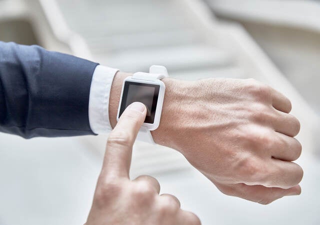 Man checking his smart watch