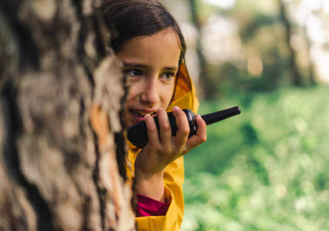 Girl playing with connected toys