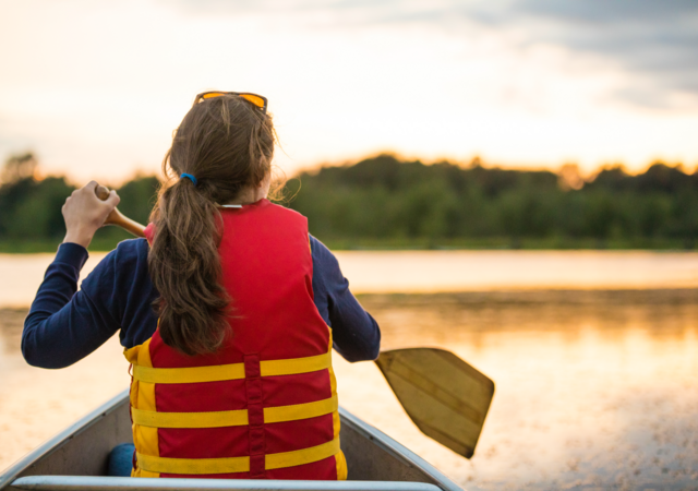 Woman wearing personal flotation device