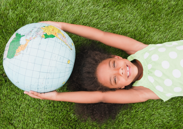 Child with a globe