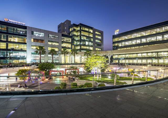 Exterior of an office building complex at twilight