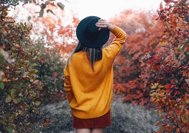 Luxury woman in autumnal landscape 