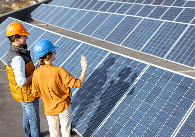 Engineers on a solar power station