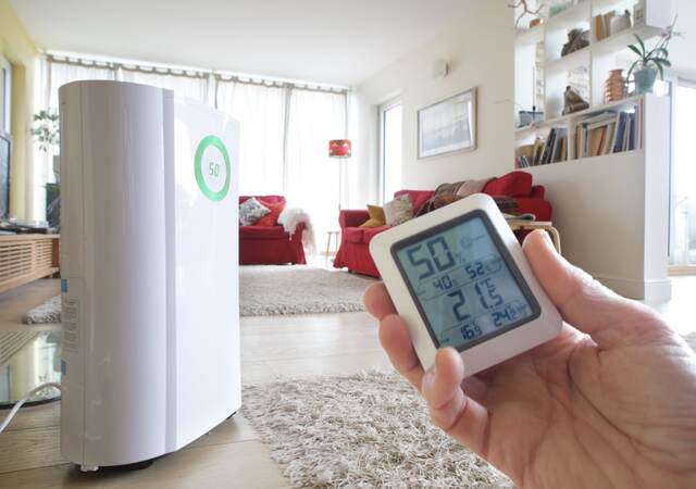 Dehumidifier and energy monitor in home.