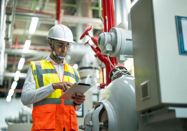 Engineer looking at a tablet