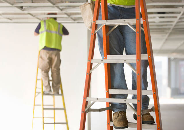 workers on ladders