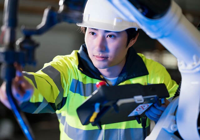 engineer checking robotics welding