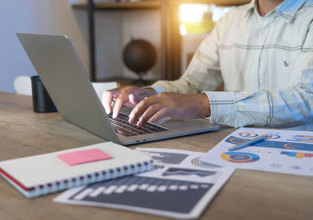 Person working on a laptop