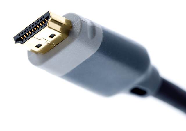 HDMI cable connector on white background.