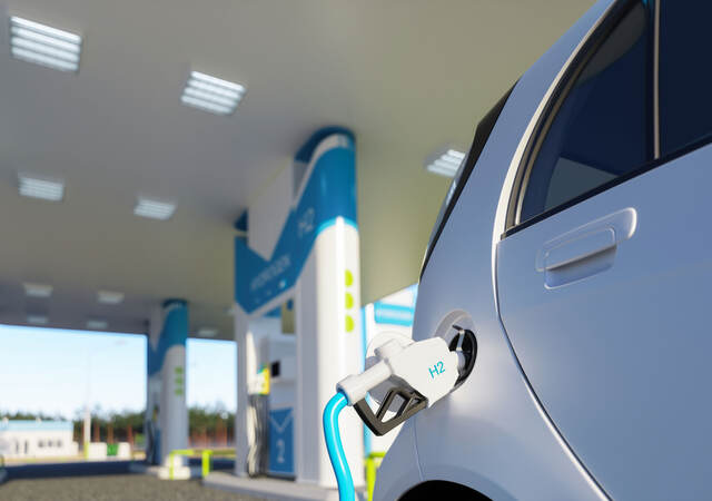 Hydrogen refueling a car on the filling station 