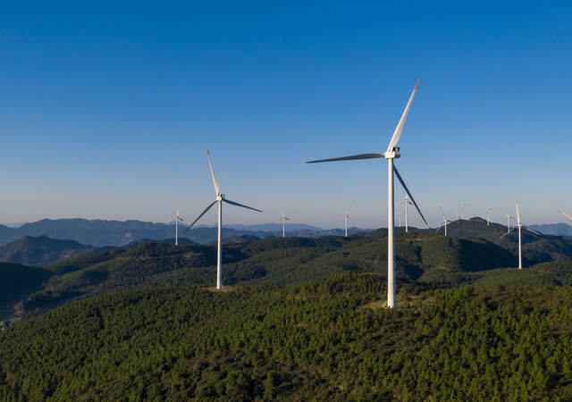 wind turbines on a hill