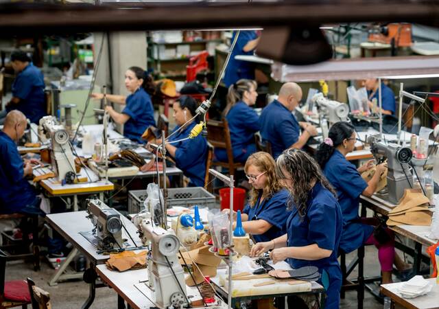 Laborers working at a textile factory.