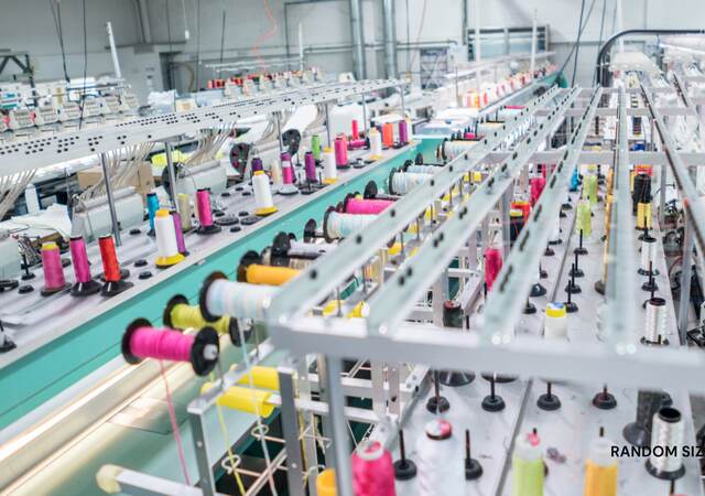 Embroidery machine at a clothing factory.