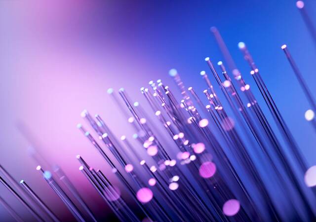 Fiber optics abstract background - Purple Blue Data Internet Technology Cable.