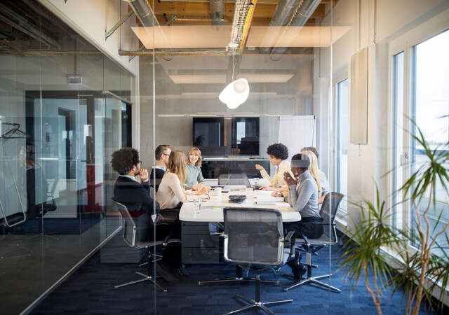 People having a meeting in a modern office