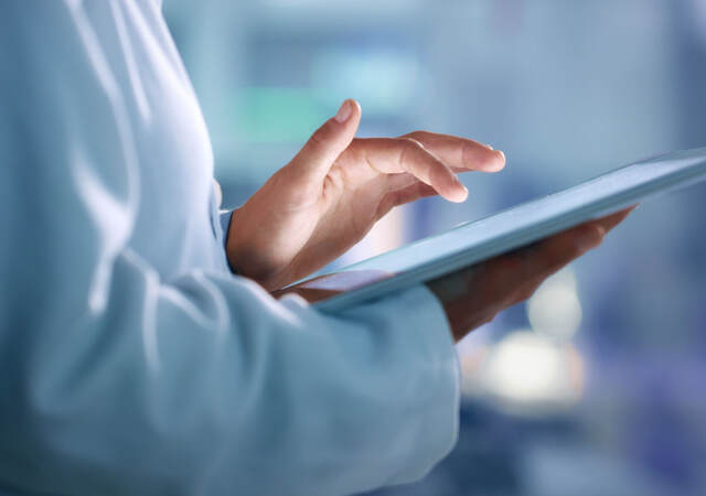 Doctor holding a tablet