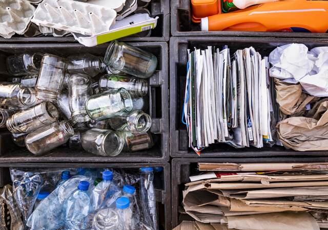 Boxes with Separate collection of waste for recycling to become recycled content.