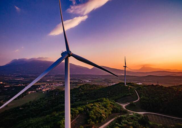 Closeup of a wind turbine at dawn