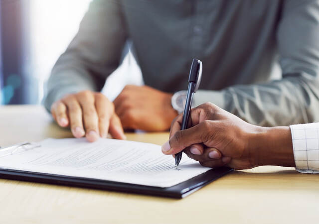 a person signing legal papers