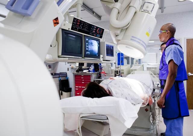 Person undergoing an x-ray in lab