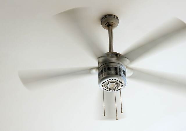 Low angle view of ceiling fan